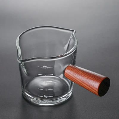 Copo de medição de vidro de borosilicato transparente de 100 ml com tampa estilo de design minimalista