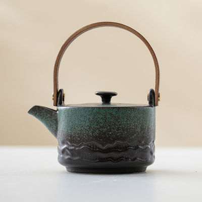 Conjunto de chá de Kung Fu cerâmico com alça de elevação de feixe Compacto Chá de uma só panela