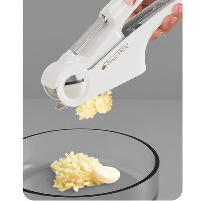 Aço inoxidável 4 em 1 Multifuncional Triturador de alho e cortador com utensílios de abertura de latas